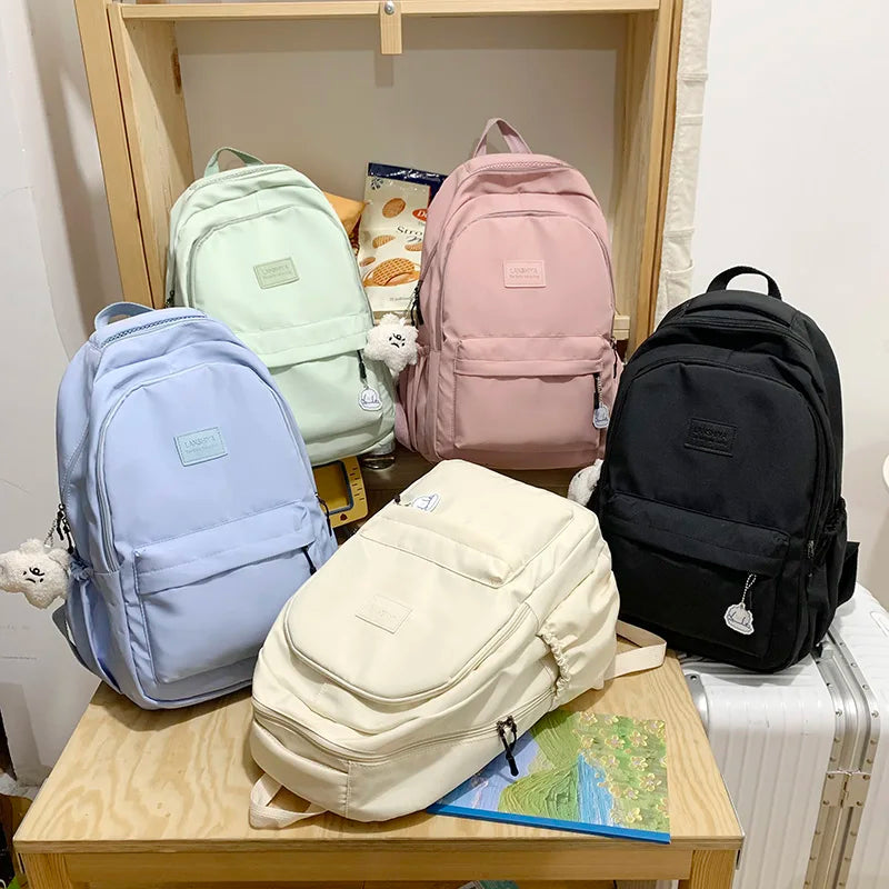 Large Capacity Solid Color Backpack for High School Students, Simple Black Trave - Detail View