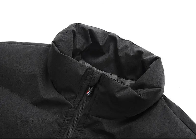 Close-up of a black jacket's collar with text on a white background