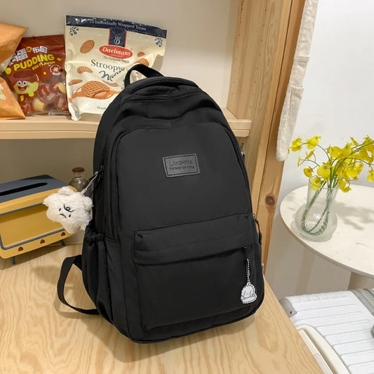 Large Capacity Solid Color Backpack for High School Students, Simple Black Trave - Main View