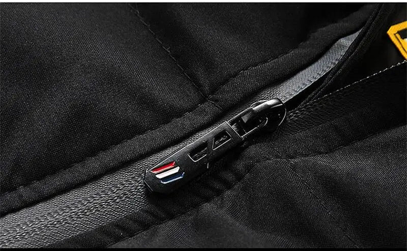 Close-up of a black jacket zipper with a brand logo, featuring the text '拉链设计' at the bottom.