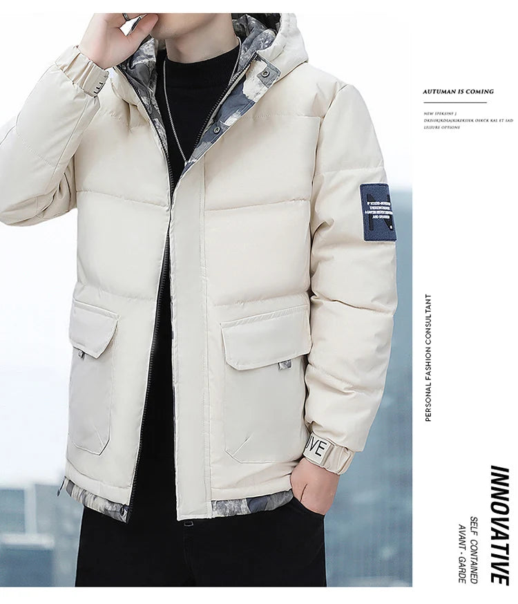 Person wearing a beige puffer jacket with a blurred background