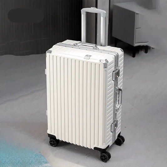 White suitcase with black wheels on a light gray floor, featuring the Myco brand logo.