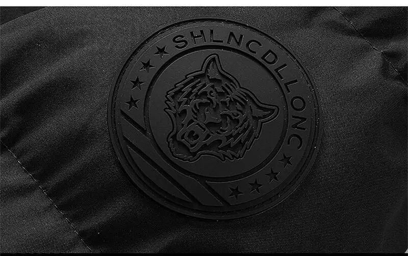 Black logo with a wolf design on a black background