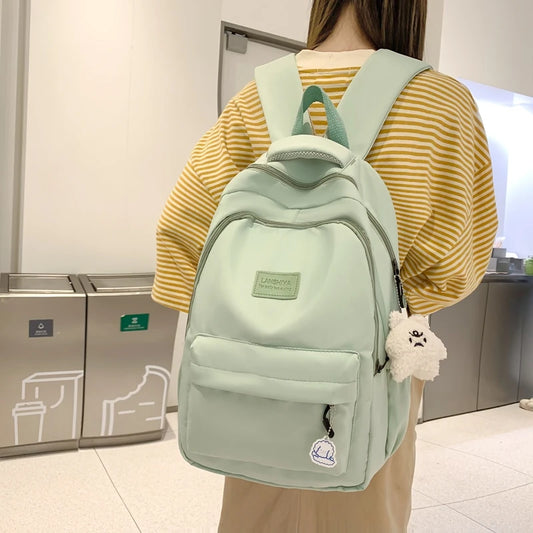 Large Capacity Solid Color Backpack for High School Students, Simple Black Trave - Side View